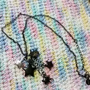 Claires black star dangle necklace
